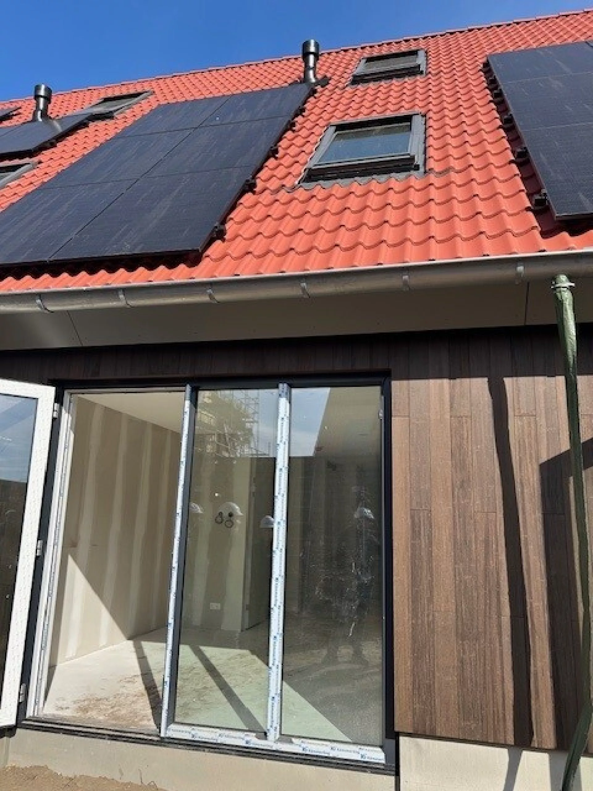 Heideslag: gevel gemaakt van samengeperste bamboe-delen